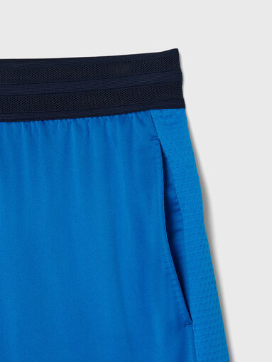 Tennis shorts with logo embroidery - 4
