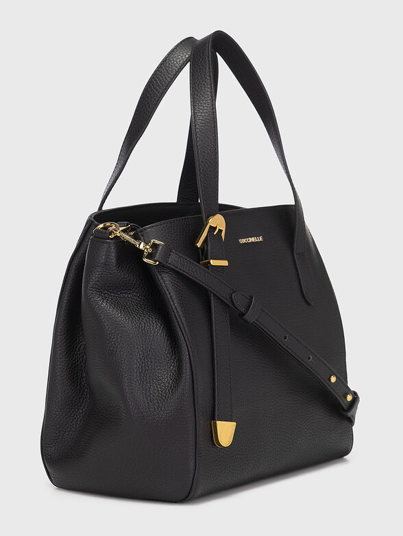 Black leather bag with golden details - 5