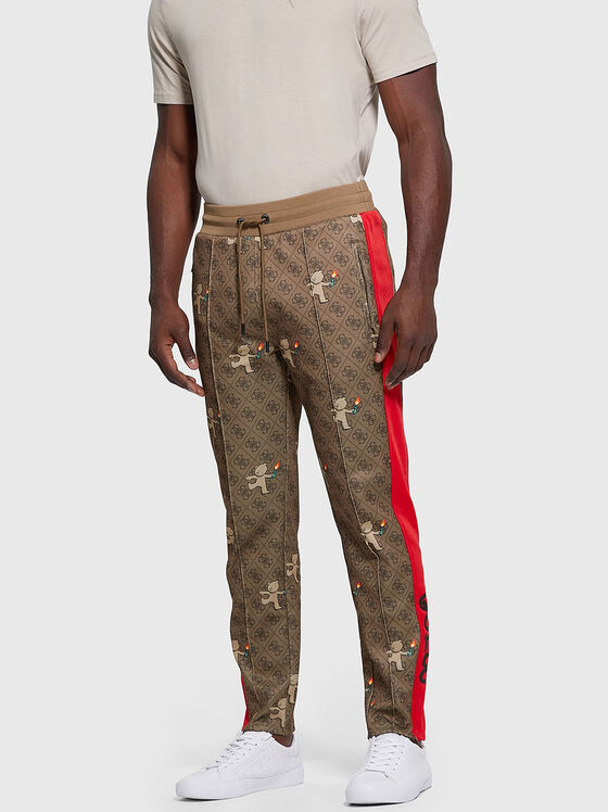 Sports trousers with monogram print  - 1