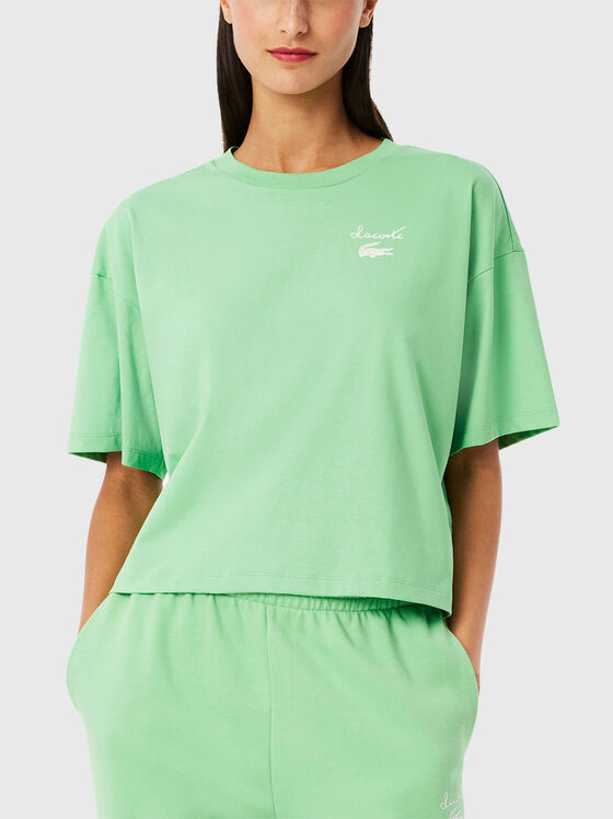 Tricou din bumbac cu decolteu oval în verde - 1