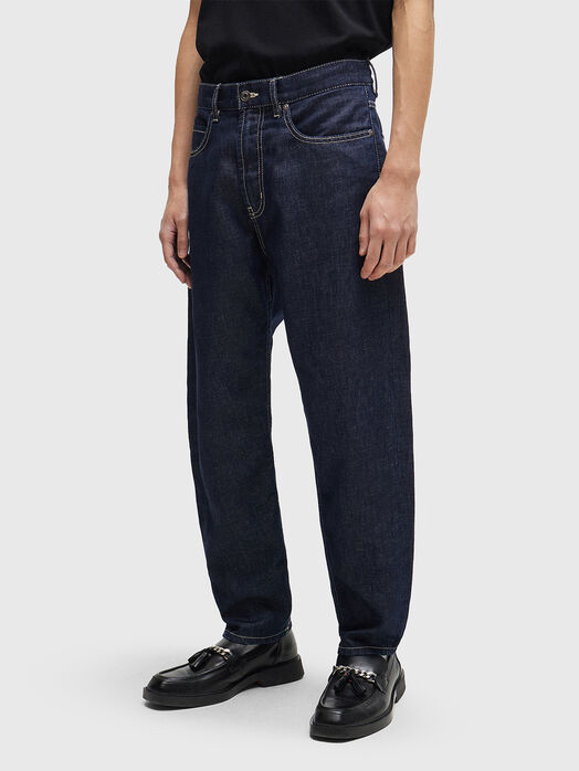 Dark blue jeans with contrast logo patch