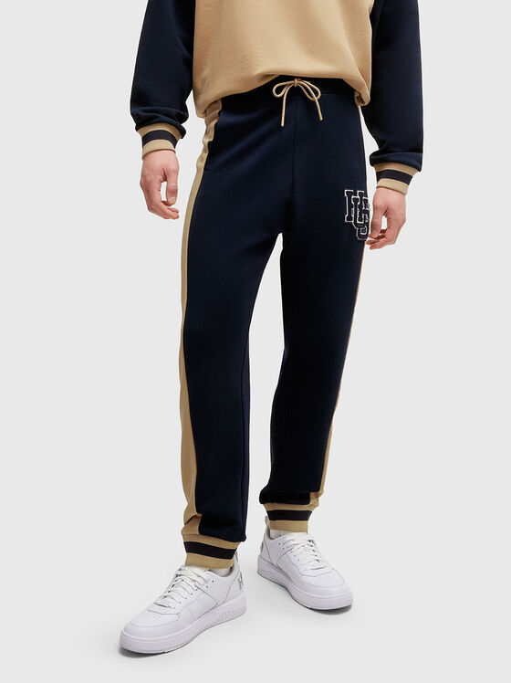 Sports pants with logo patch - 1