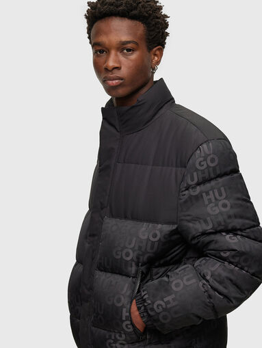Black puffer jacket with monogram print - 4
