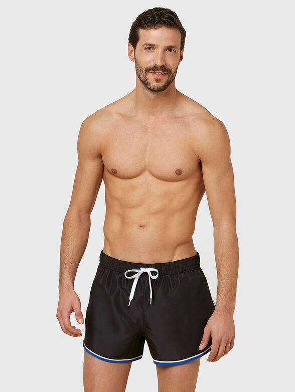 PASSEPARTOUT beach shorts in black - 4